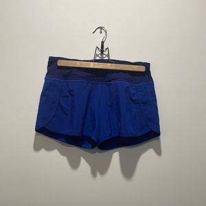 Lululemon Speed Up Mid ride shorts. Size 4. Blue.